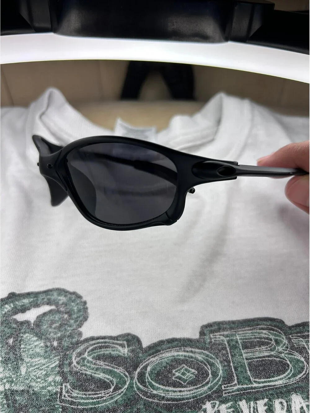 Black oval Sunglasses with Dark Lenses